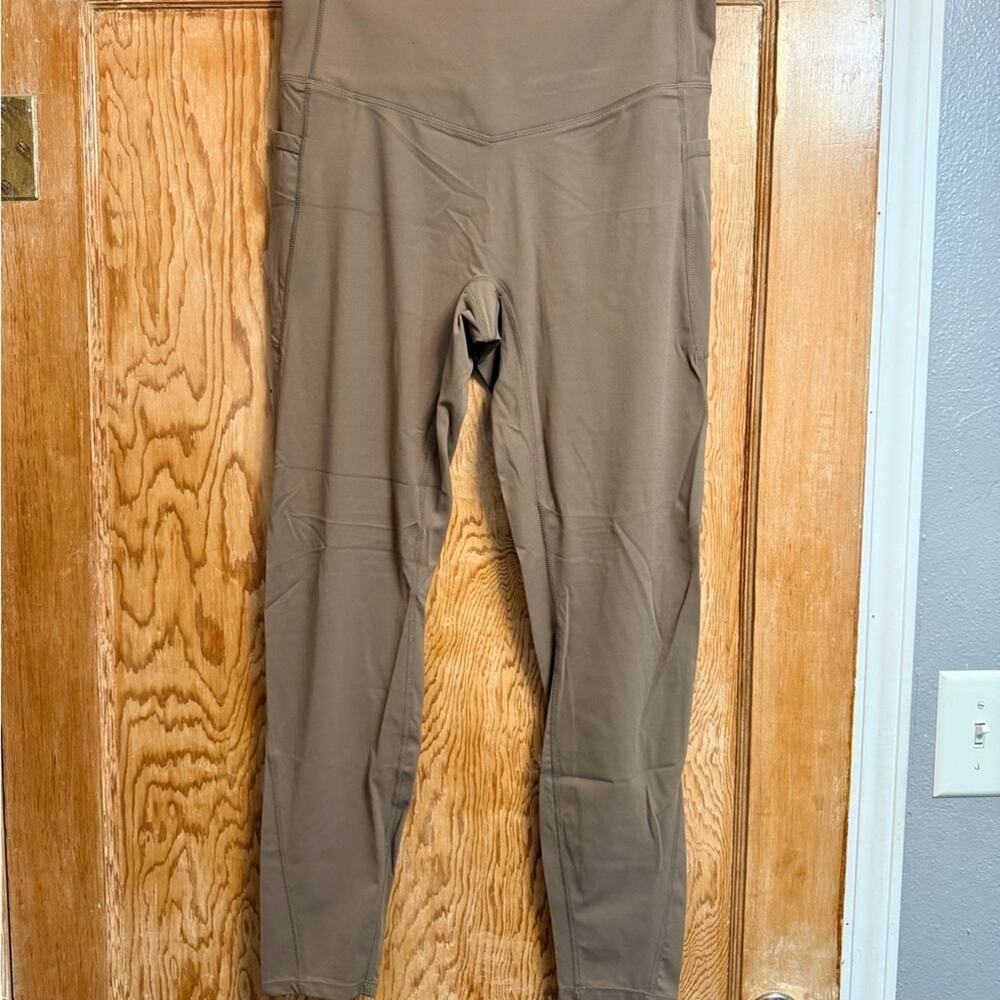 Halara Slimming Women’s Dawn Brown High Waisted leggings with pockets. - Picture 3 of 8